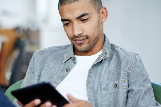 person reading on a tablet