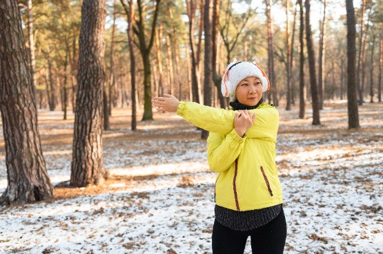 runner stretching on a run break