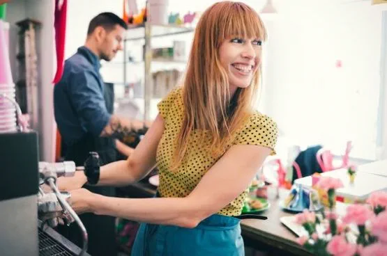 woman at an espresso machine