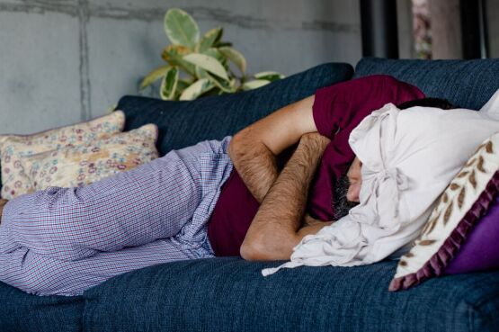 man sleeping on the sofa