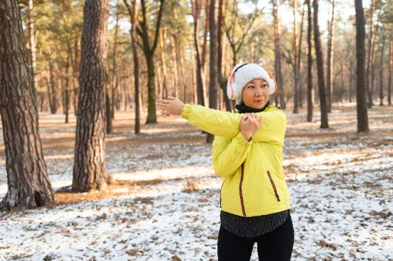 runner stretching on a run break