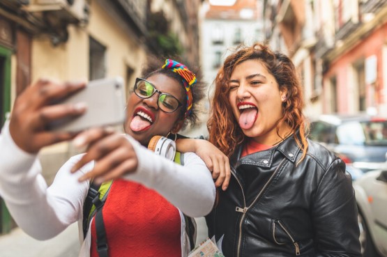two friends take a selfie together