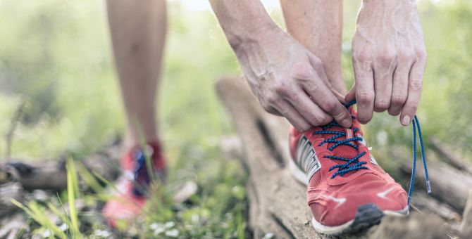 Man tying laces