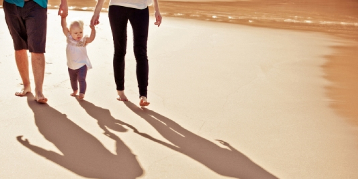 Image of a family on the beach