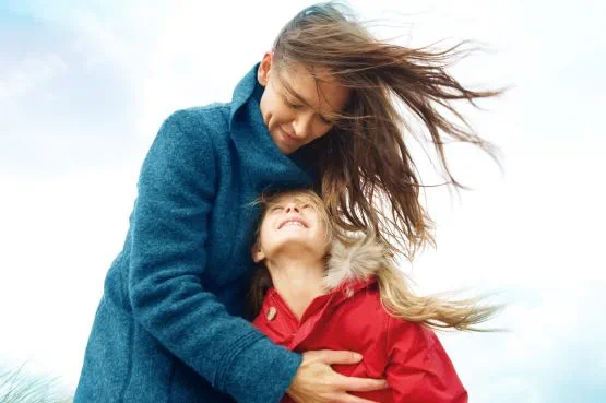 Mother and daughter are enjoying outdoors