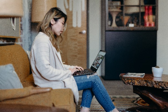 a woman on a laptop at home