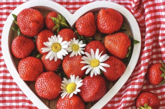 strawberries in a heart shaped bowl