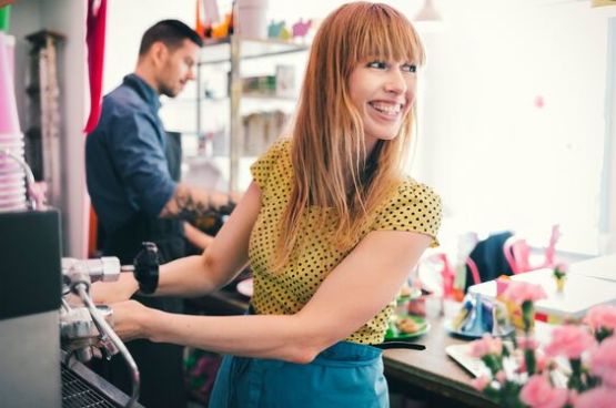 woman at an espresso machine