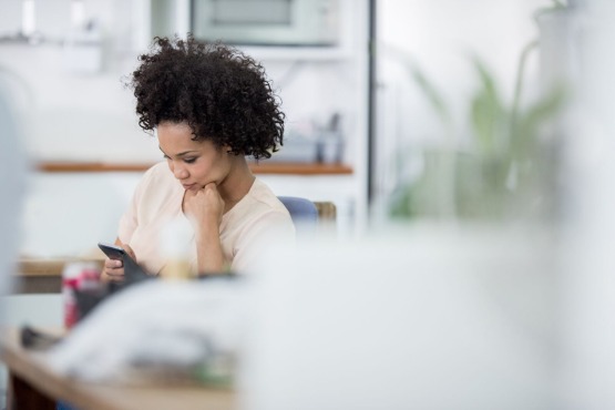 person texting on a mobile phone