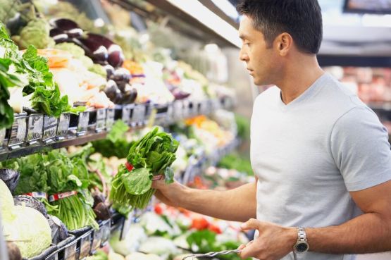 person shopping for fruit and veg