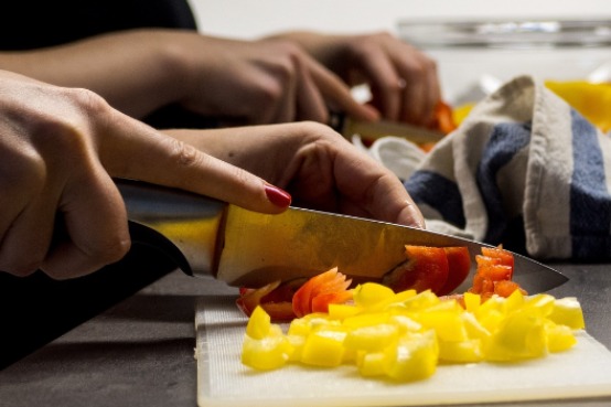 people chopping vegetables