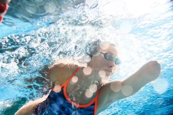 a disabled person swimming