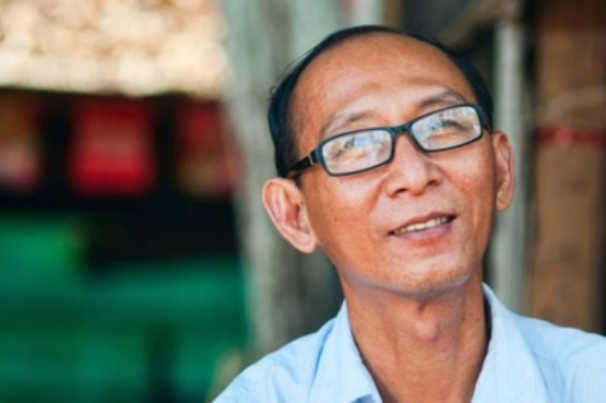 Man wearing glasses standing outdoors