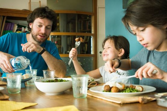 family having dinner together