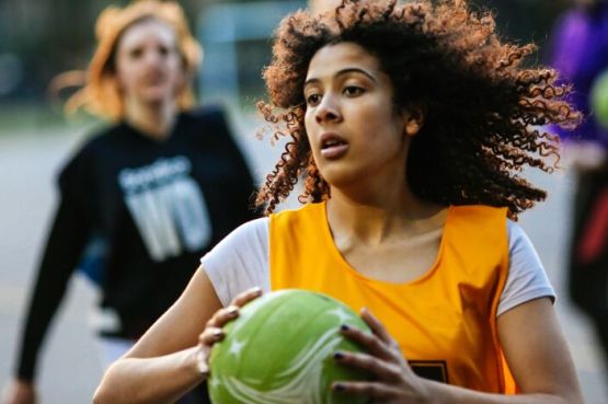people playing netball outdoors