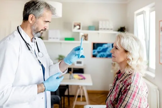 doctor examining patient