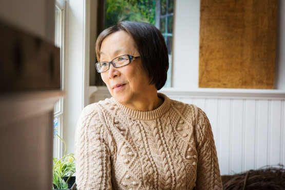 woman gazing out of the window