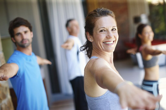 a group of people in an exercise class
