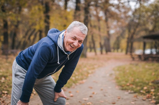 person resting outdoors while on a walk