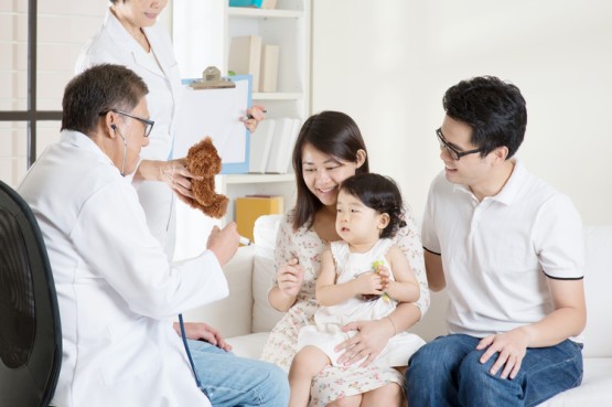 doctor vaccinating a child