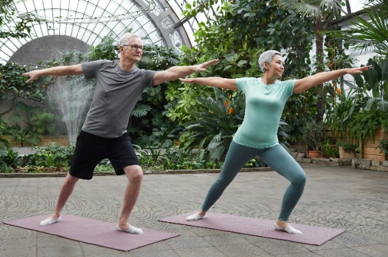 two older adults exercising