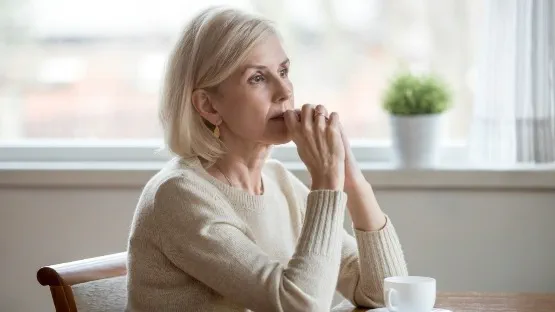 woman looking deep in thought