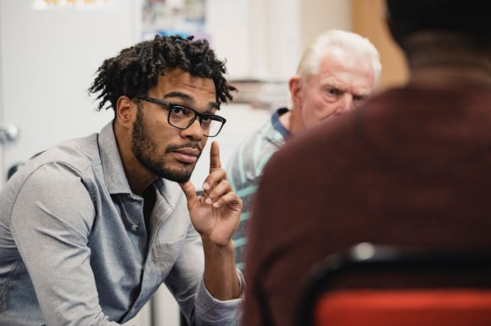 person listening in a group session