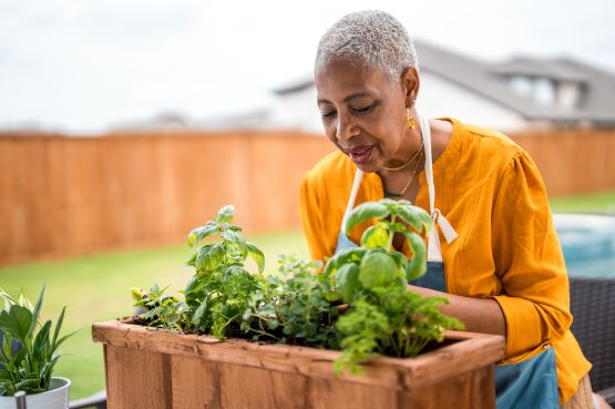 woman planting in the garden