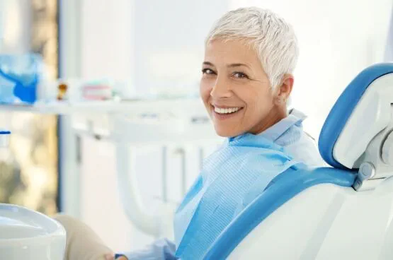 dentist patient smiling after treatment