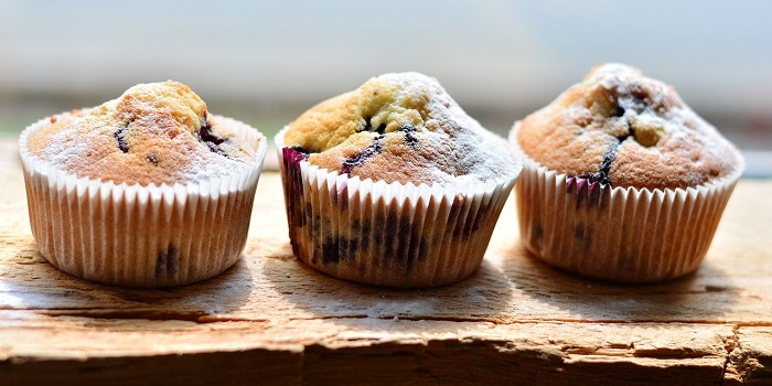 three blueberry muffins