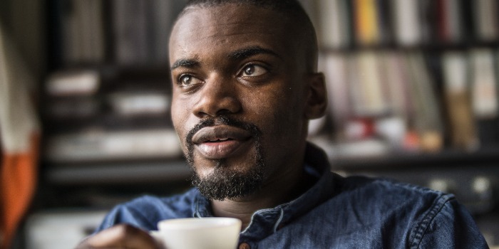 A man drinking a coffee
