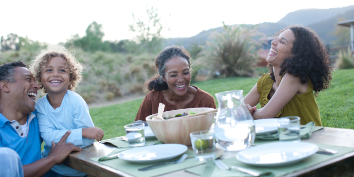 A family eating outdoors