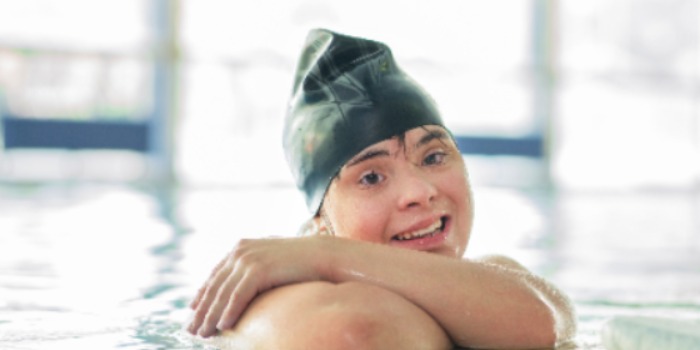 swimmer resting in the pool