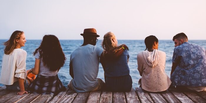 a group of people on the pier