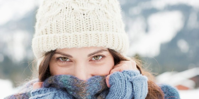 person wrapped in a scarf outdoors