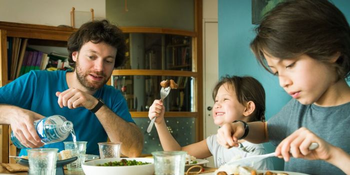 family having dinner together