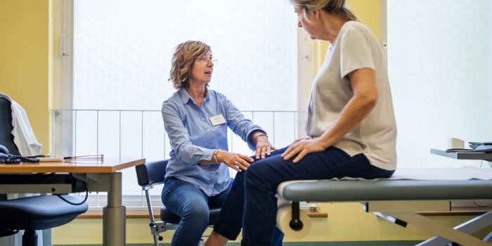 person having a knee consultation