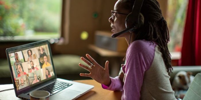 person taking a work video call from home