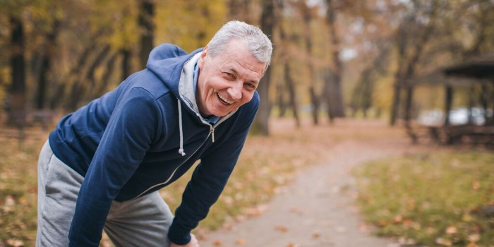 person resting outdoors while on a walk