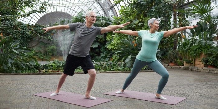 two older adults exercising