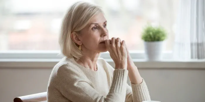 woman looking deep in thought