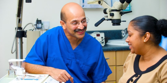 dentist talking to a patient