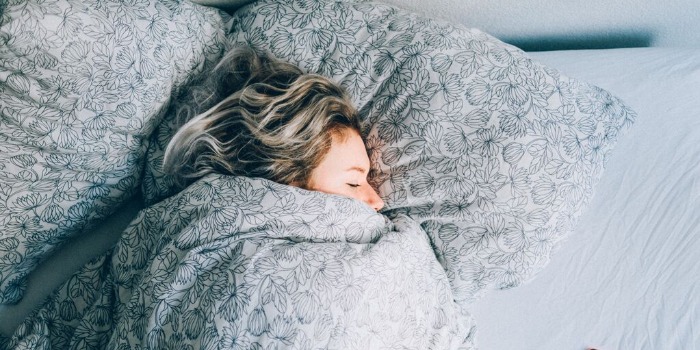 person-sleeping-in-bed