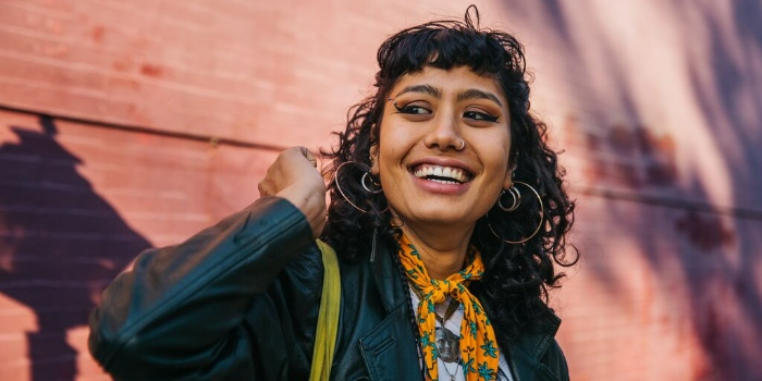 woman smiling outdoors