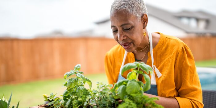 woman planting in the garden