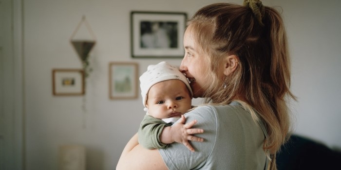 mother holding new born