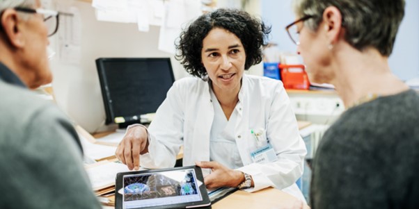 patient discussing things with a doctor