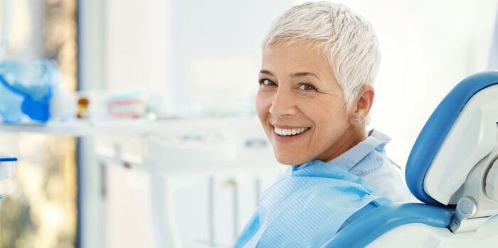 dentist patient smiling after treatment