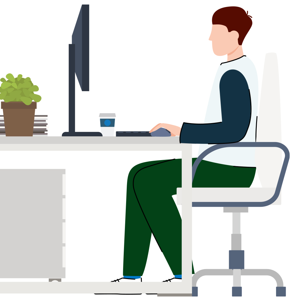 An image of a person sitting at a desk