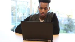 A man on a laptop